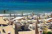 Tourists On The Beach Of Cannes French Riviera